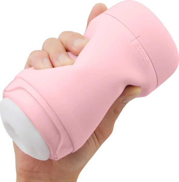 Tenga Puffy Strawberry Pink masturbator in strawberry pink, with its cap