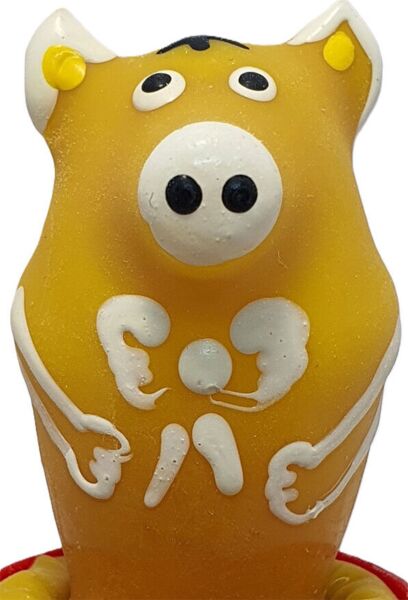 Decorative Condomerie Pig Sitting Yellow condom shaped like a seated yellow pig